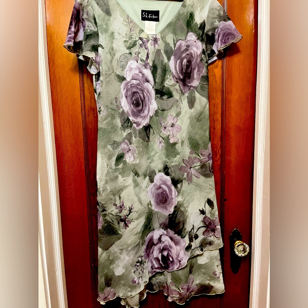 Flower print dress with cap sleeves and scalloped hem.